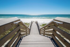 A wooden boardwalk leading to a beach with a clear view of the ocean. - Palms North 3b - Sea La Vie - Deeded Beach Access! (Santa Rosa Beach)