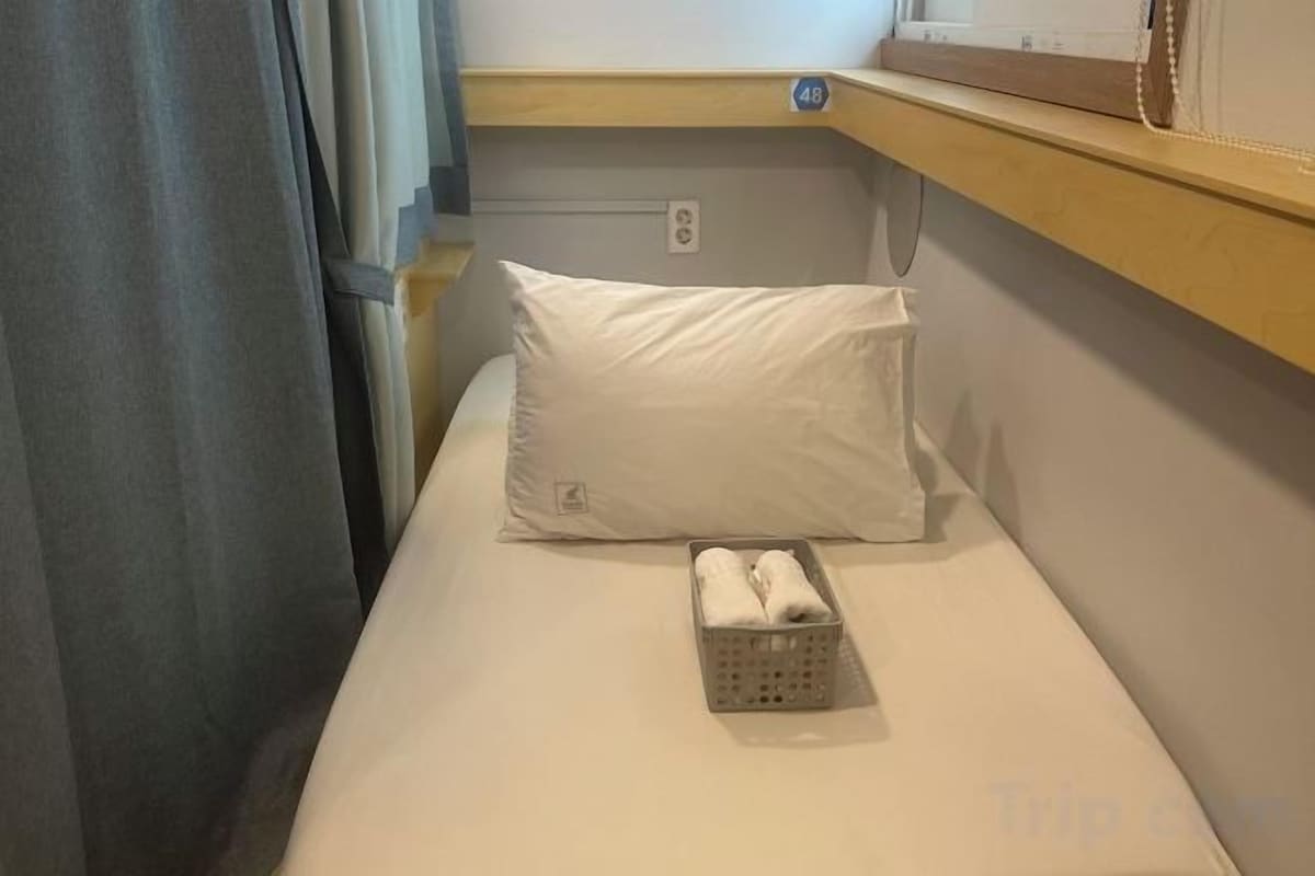 Blackout curtains, iron/ironing board (on request)