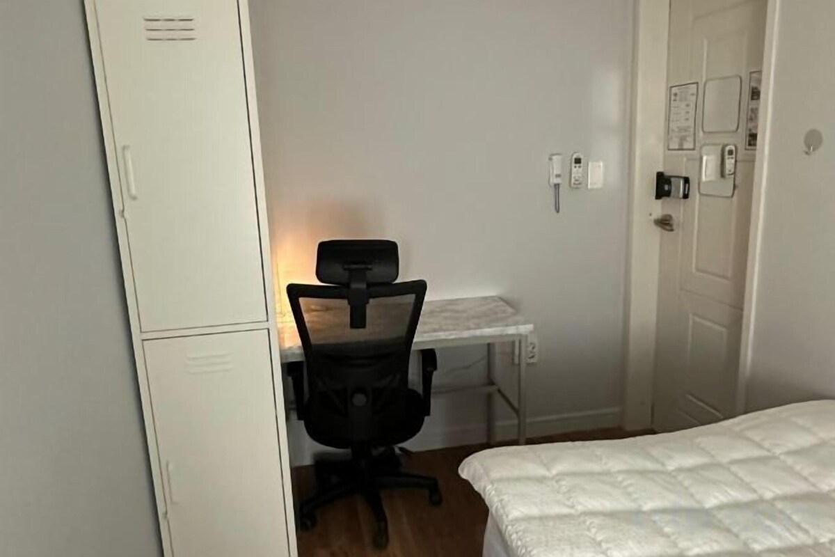 Blackout curtains, iron/ironing board (on request)