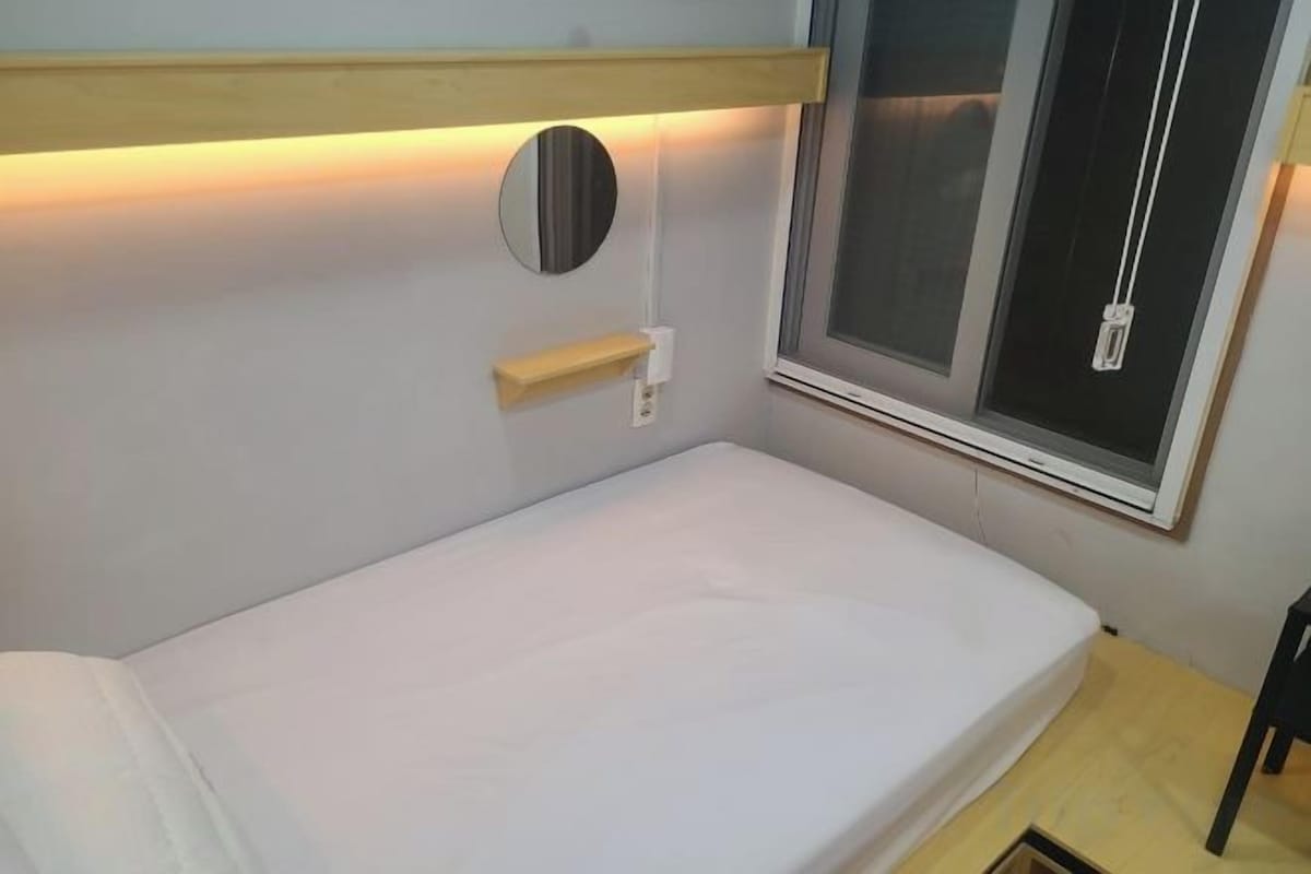Blackout curtains, iron/ironing board (on request)