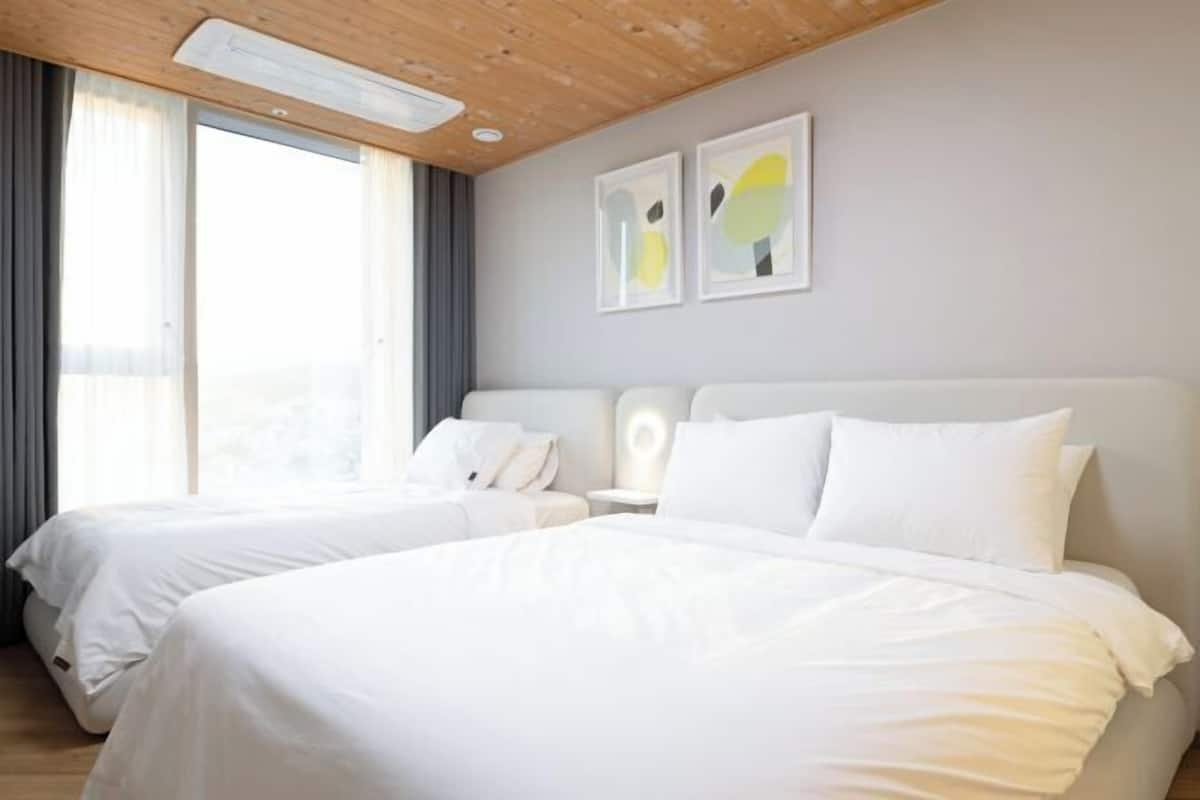 2 habitaciones, ropa de cama de alta calidad y cortinas blackout