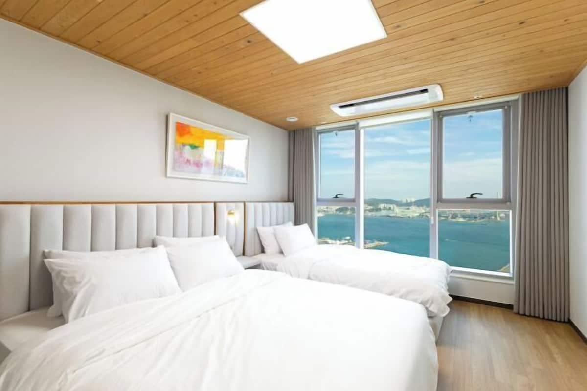2 habitaciones, ropa de cama de alta calidad y cortinas blackout
