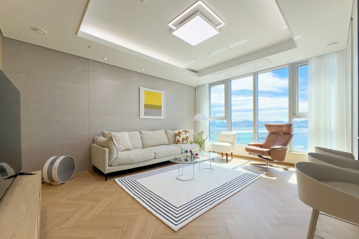 Two Bed Ocean A | منطقة المعيشة | أرضيات مدفأة