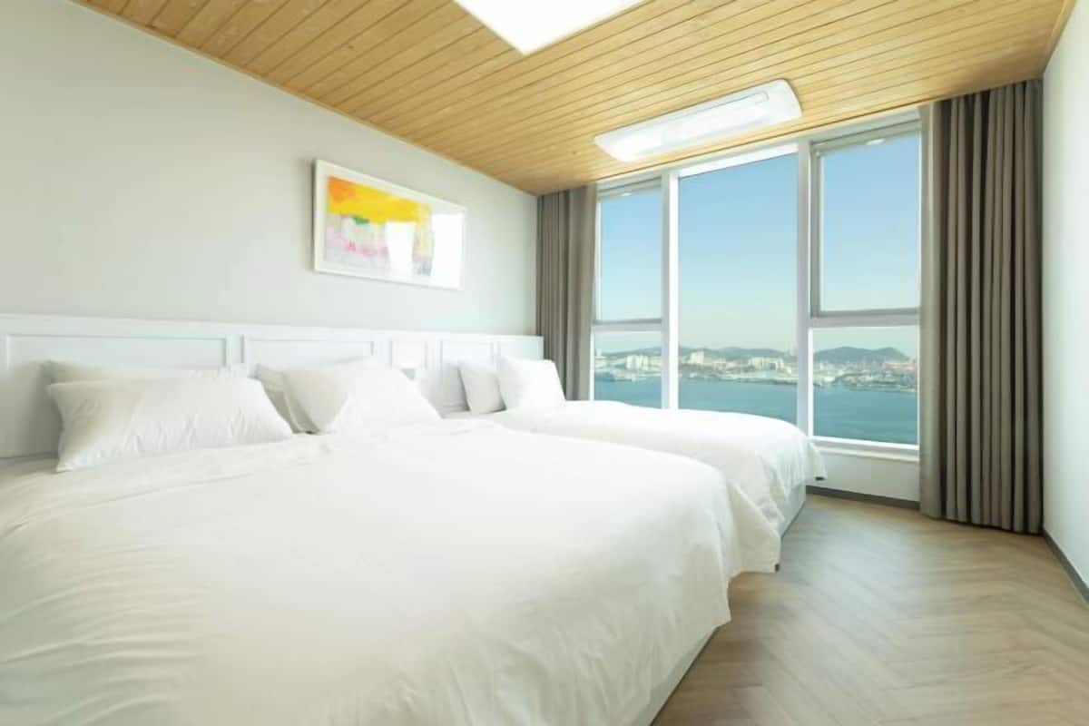 2 habitaciones, ropa de cama de alta calidad y cortinas blackout