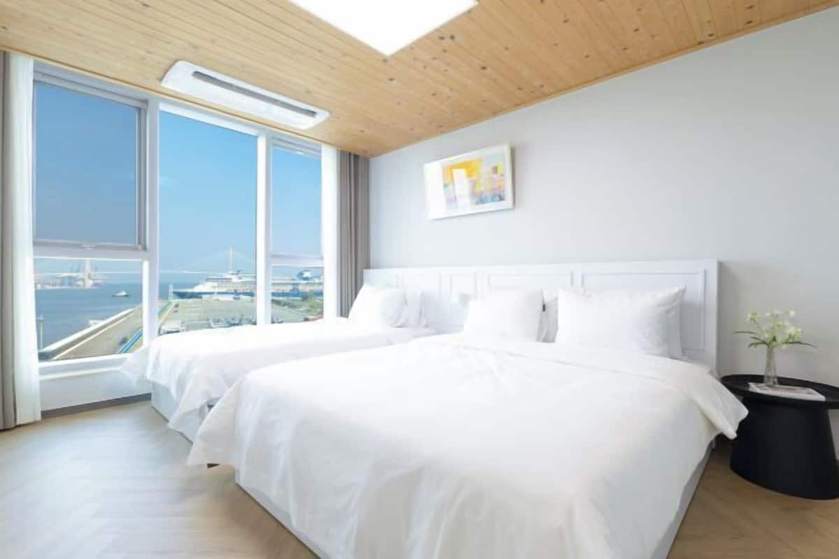 2 habitaciones, ropa de cama de alta calidad y cortinas blackout