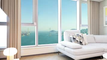 Family Suite Ocean A | Área de sala de estar | Piso con calefacción