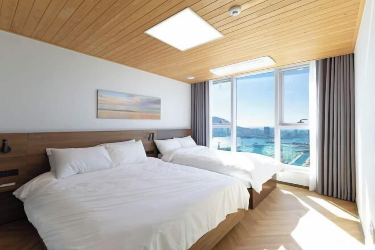 2 habitaciones, ropa de cama de alta calidad y cortinas blackout