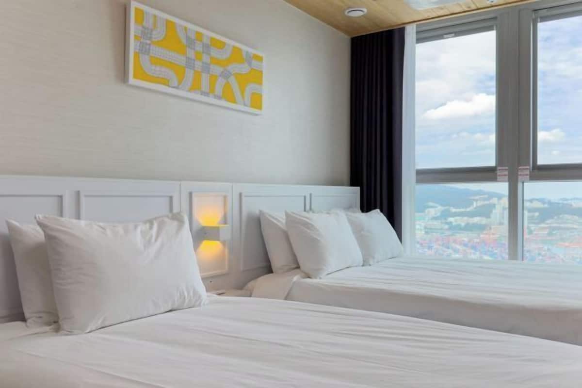 2 habitaciones, ropa de cama de alta calidad y cortinas blackout