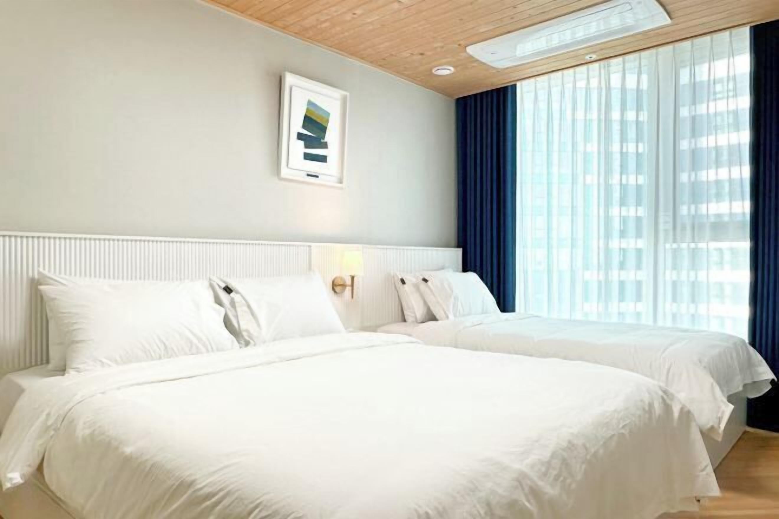 高档床上用品、遮光窗帘、免费 WiFi、床单