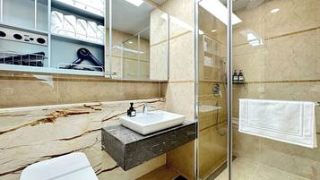 Hair dryer, bidet, towels, shampoo