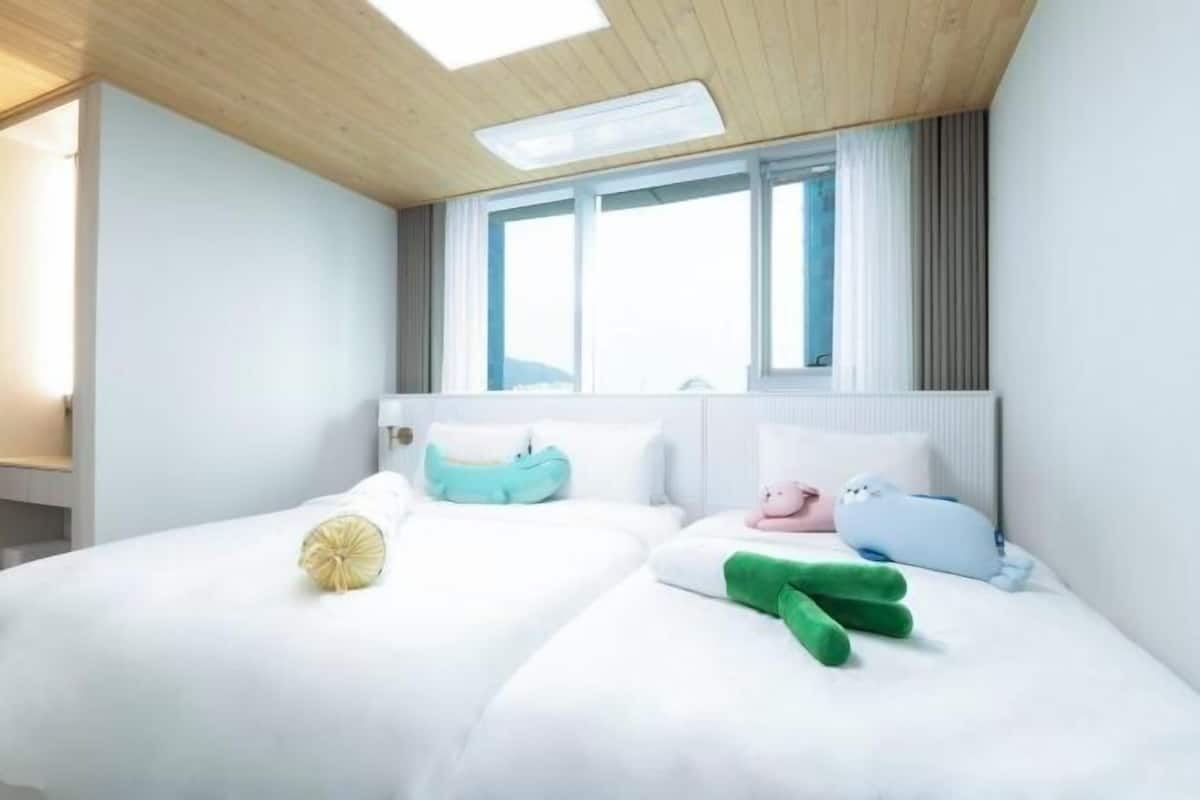 2 habitaciones, ropa de cama de alta calidad y cortinas blackout