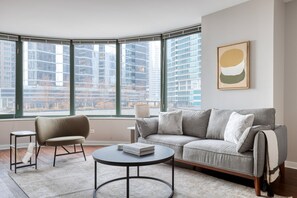 TV, stereo - Amazing Streeterville 2BR w/ Gym & Pool, Ohio St beach, by Blueground (Chicago)