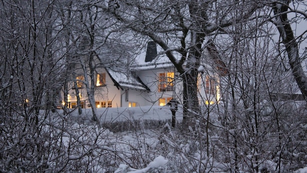 A snow-covered landscape with a building featuring multiple windows and a visible balcony. - Apartment No. 3 with terrace, 1 bedroom, max. 2 persons (Kirchhundem)