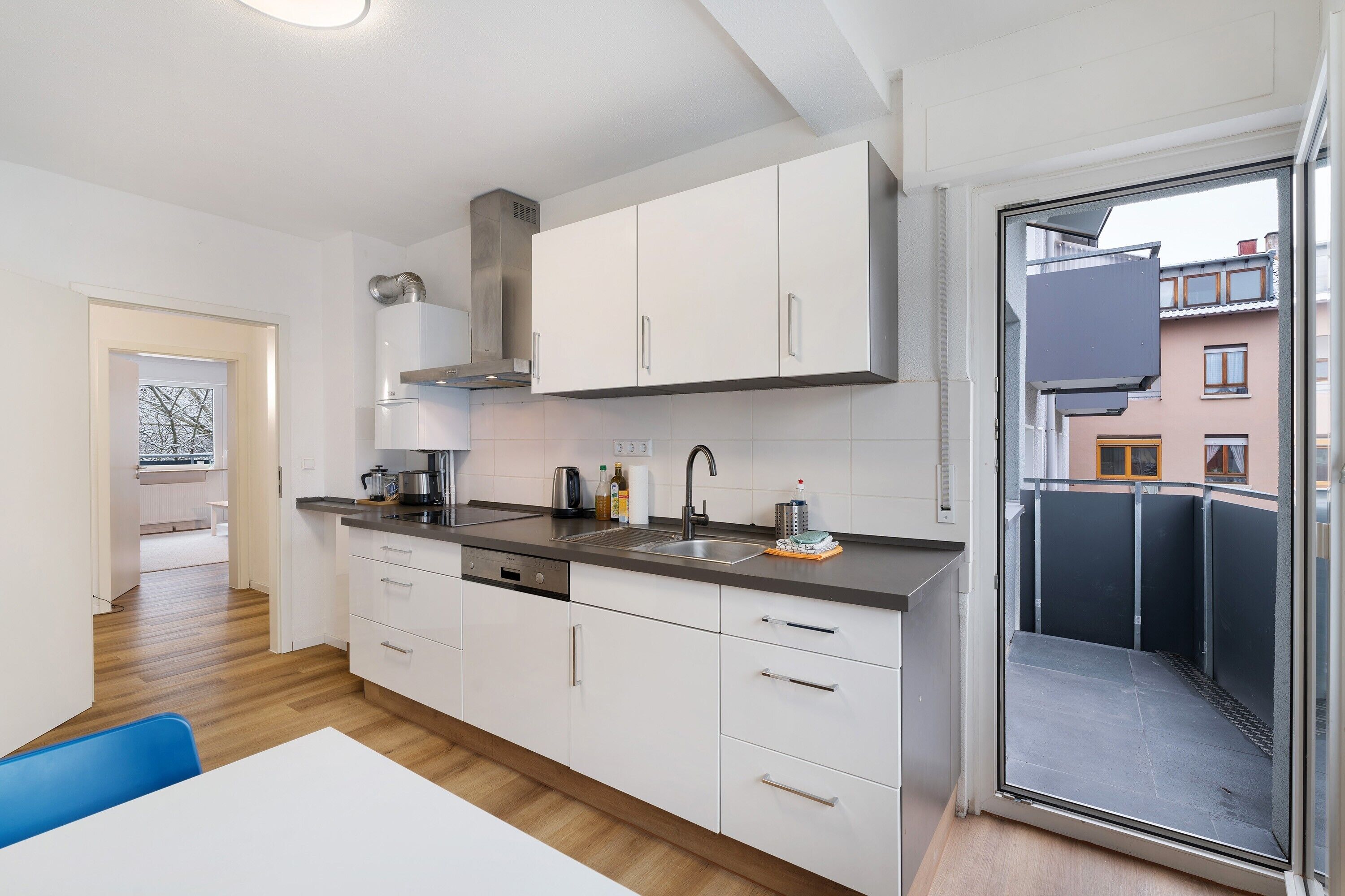 Fridge, stovetop, dishwasher, coffee/tea maker