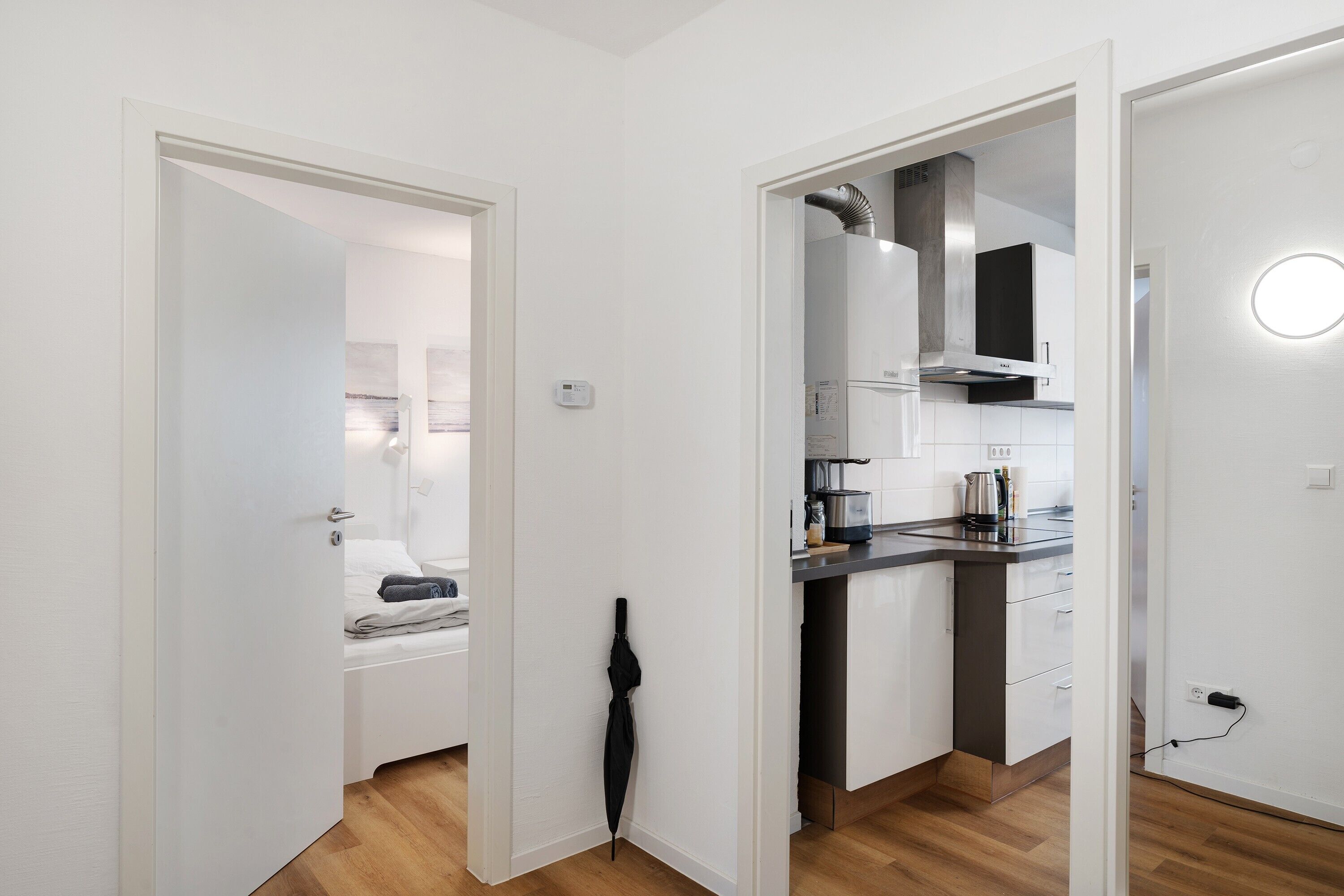 Fridge, stovetop, dishwasher, coffee/tea maker