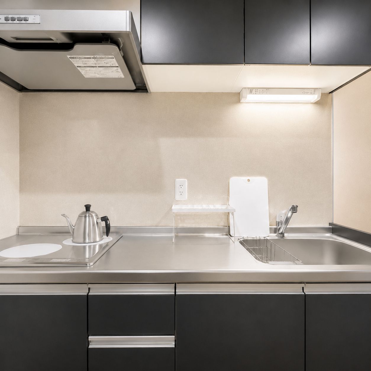 Full-size fridge, microwave, stovetop, cookware/dishes/utensils
