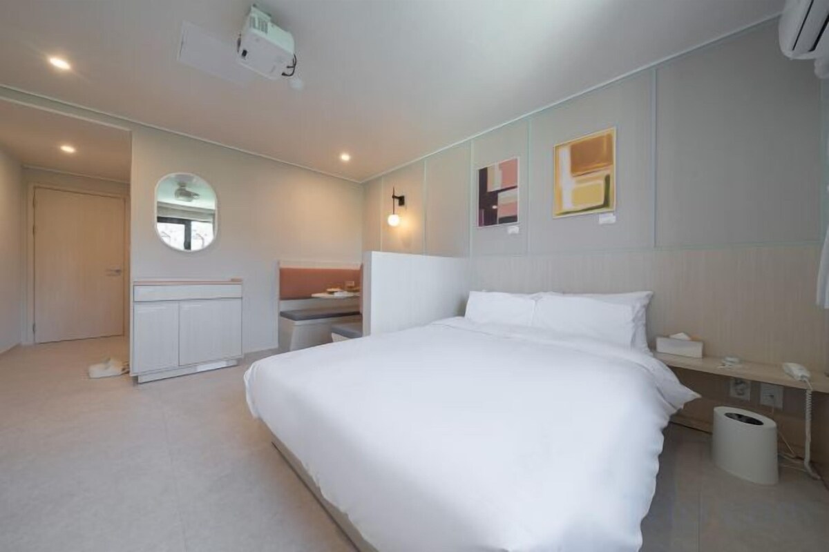 Premium bedding, blackout curtains, soundproofing, free WiFi