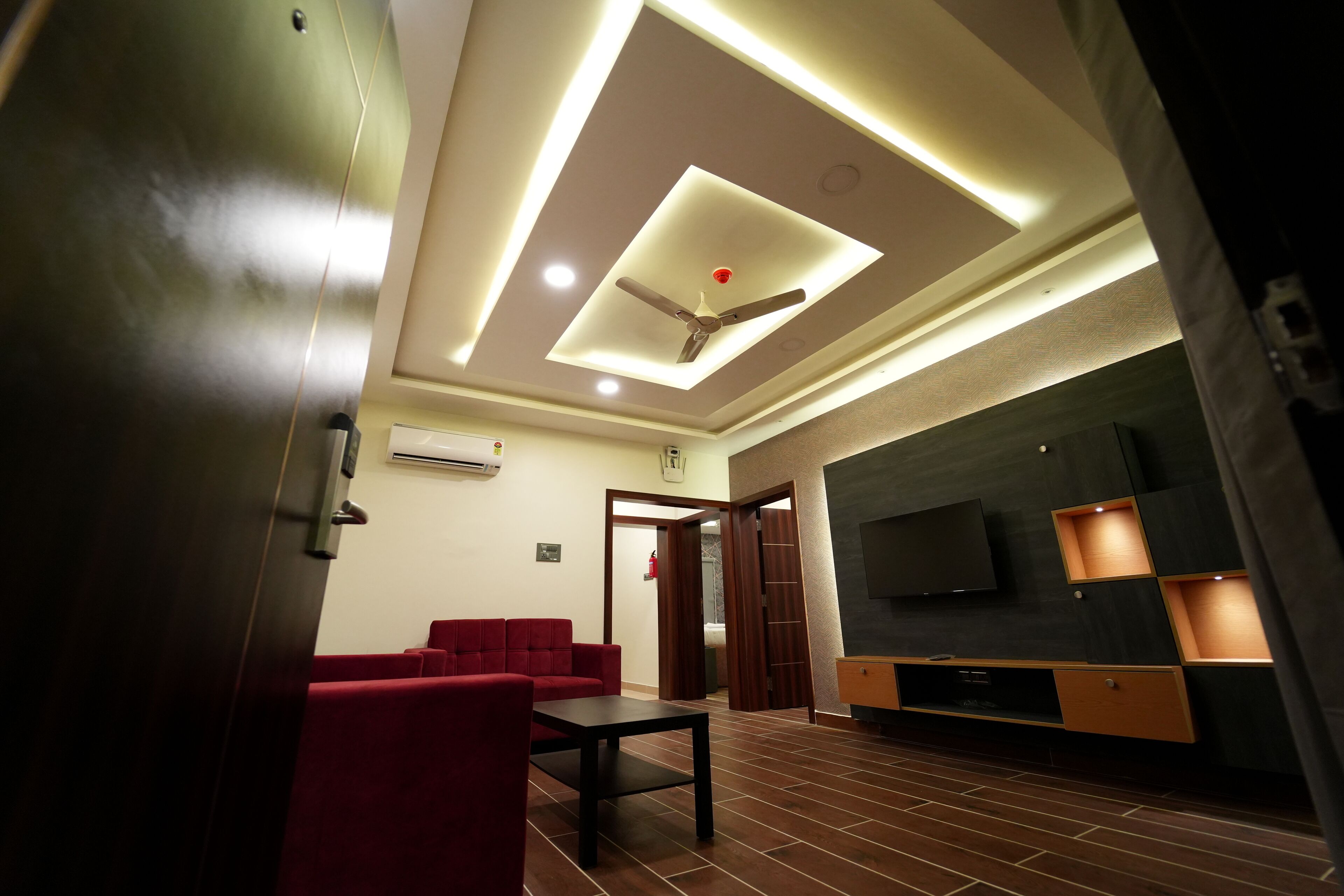 Premium Suite | Living area | 43-inch Smart TV with premium TV channels, Netflix, pay films