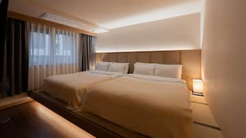 Habitación Deluxe con 1 cama matrimonial o 2 individuales | Ropa de cama hipoalergénica y wifi gratis