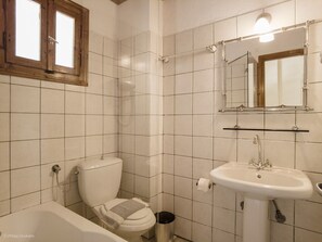 Baignoire, sèche-cheveux