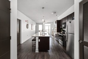 Fridge, microwave, oven, stovetop - Cozysuites Spacious 2BR next to Whole Foods (Indianapolis)