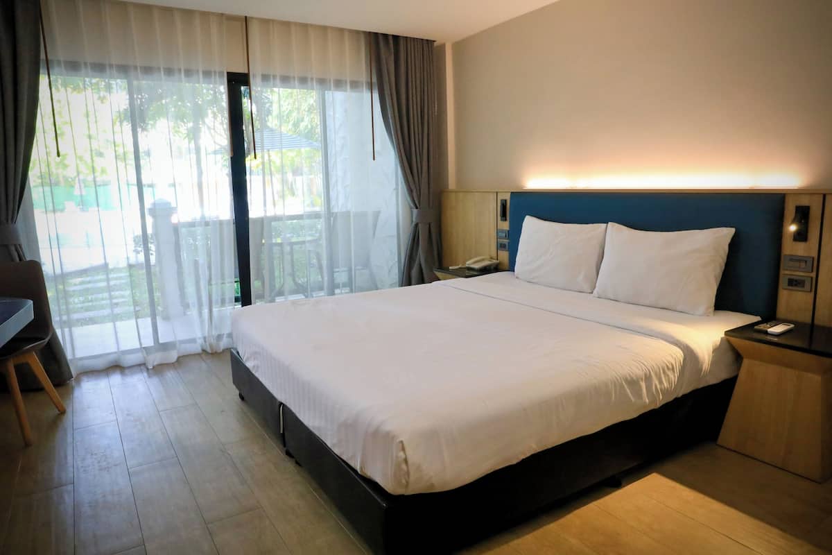 Kahden hengen elite-huone | Ylelliset vuodevaatteet, untuvapeitot, minibaari, tallelokero huoneessa