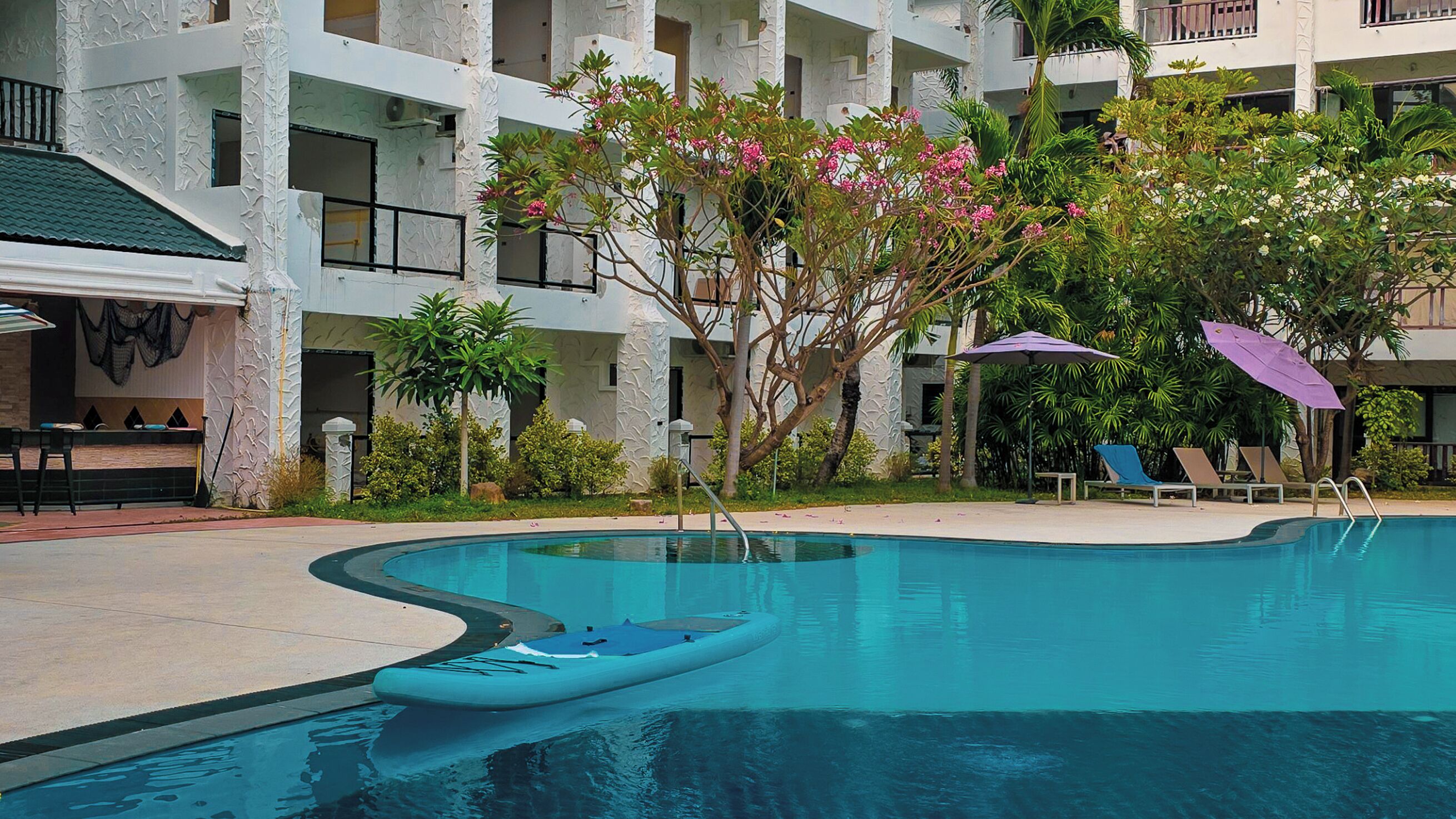 2 indoor pools, open 8:00 AM to 9:00 PM, pool umbrellas, pool loungers