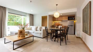 ALANNA SIGNATURE DUPLEX SUITE | Living area | 43-inch flat-screen TV with digital channels, Netflix, first-run movies