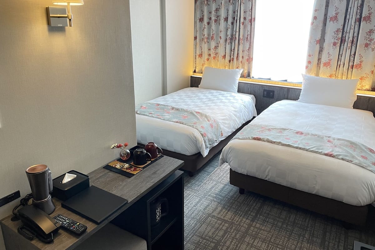 Traditionele Twin kamer, niet-roken | 1 slaapkamer, een bureau, gratis wifi, beddengoed