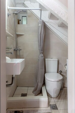 Shower, free toiletries, hair dryer, towels
