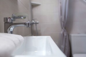 Shower, free toiletries, hair dryer, towels