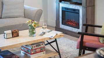 TV, fireplace, books, offices