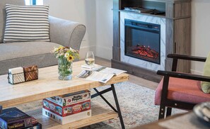 TV, fireplace, books, offices