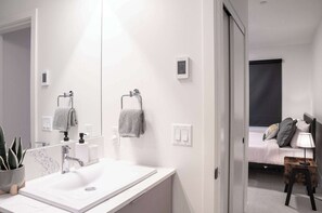 Bathtub, hair dryer, towels