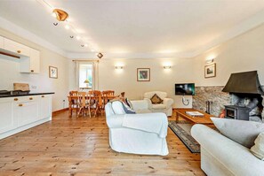 Apartment, Multiple Beds | Living area | Fireplace