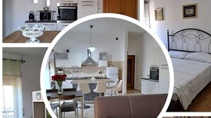 Un apartamento moderno con kitchenette, comedor, sala de estar con sofá y baño.