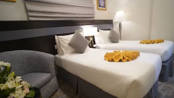 Habitación estándar con 1 cama doble o 2 individuales | Caja fuerte, tabla de planchar con plancha, wifi gratis