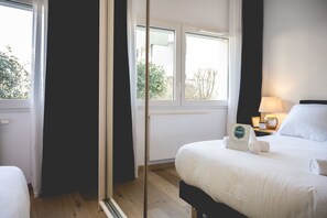 1 غرفة نوم ومكواة/لوح كي وواي فاي وملاءات أسرّة