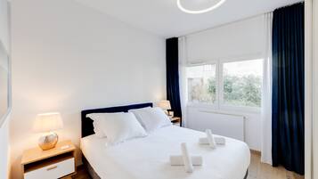 1 slaapkamer, een strijkplank/strijkijzer, wifi, beddengoed