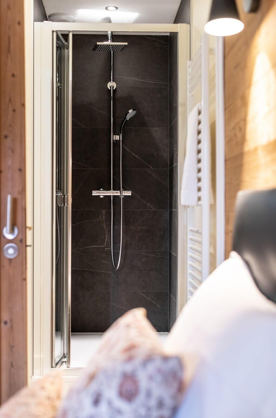 Bathtub, hair dryer, towels