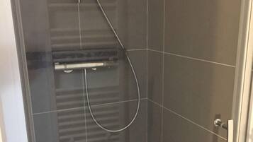 Shower, free toiletries, hair dryer, towels
