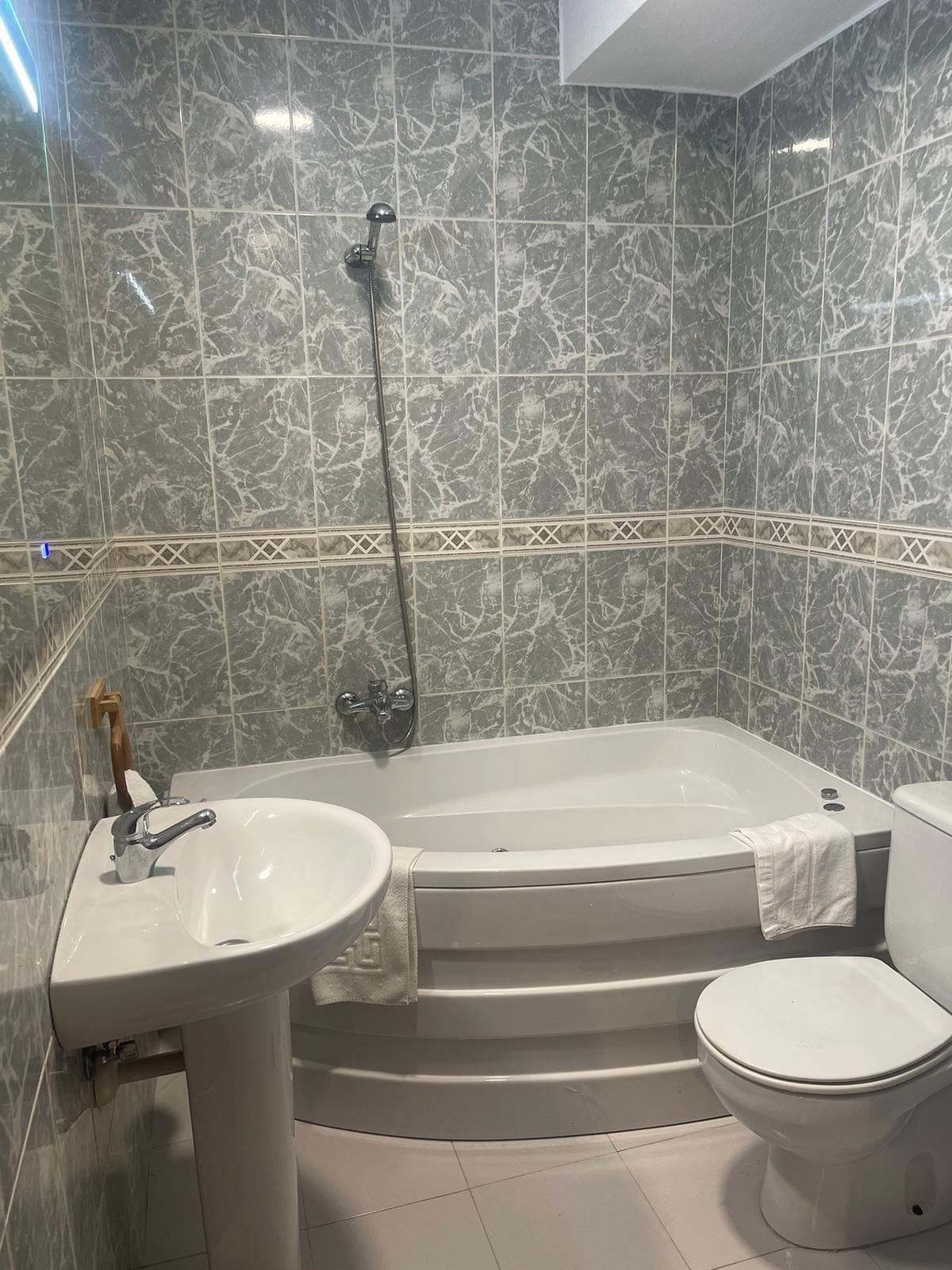 Handdoeken, zeep, shampoo, toiletpapier