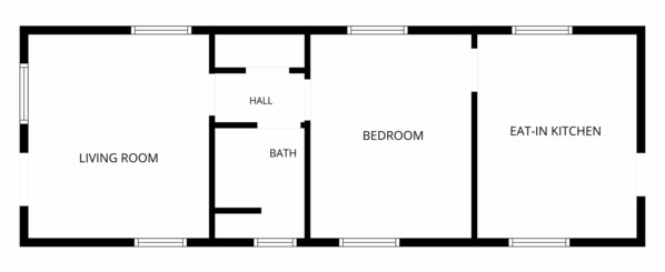 A floor plan with a living room, bathroom, bedroom, and eat-in kitchen.