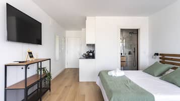 1 dormitorio, tabla de planchar con plancha, Internet y ropa de cama