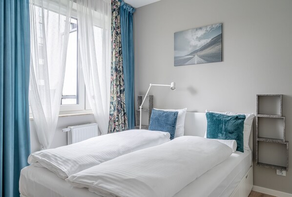 1 غرفة نوم ومكواة/لوح كي وواي فاي مجانًا وملاءات أسرّة