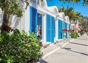 Stylish coastal architecture with arched windows and clean design.