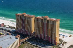 Enjoy ocean views from the hotel's elevated balconies, offering access to the beach via a pedestrian bridge.
