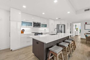 Fridge, microwave, oven, stovetop - Oceanfront Complex | Heated Pool | Luxury Finishes (Cocoa Beach)