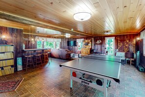 Game room - Classic country retreat with a game room, bar, expansive outdoor space, & grill (Penn Yan)
