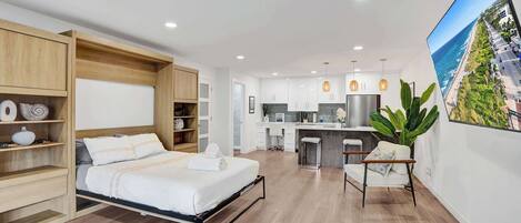 1 dormitorio, tabla de planchar con plancha, cuna de viaje y wifi gratis